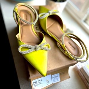 Purchased at Anthropologies. Vibrant color, satin fabric,embellished ankle strap